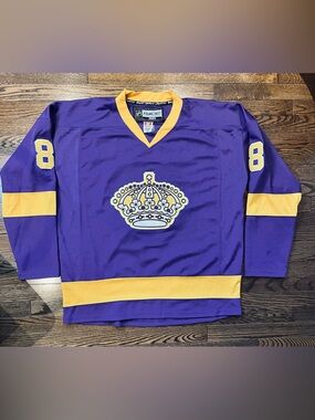 CCM Purple Hockey Jersey Tag Detail with Red Accent